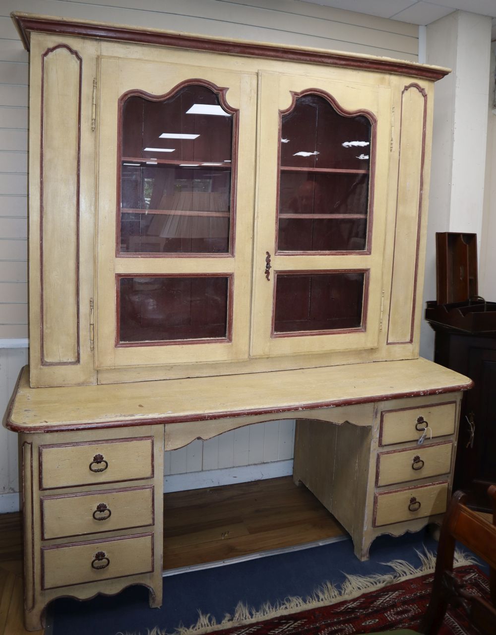 An 18th / 19th century Continental painted pine kneehole dresser, W.198cm, D.80cm, H.224cm